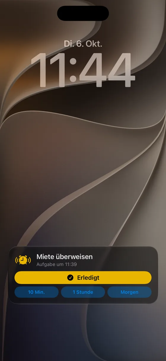 Live-Aktivität auf dem Sperrbildschirm: die klingelnde Aufgabe als erledigt markieren oder schlummern