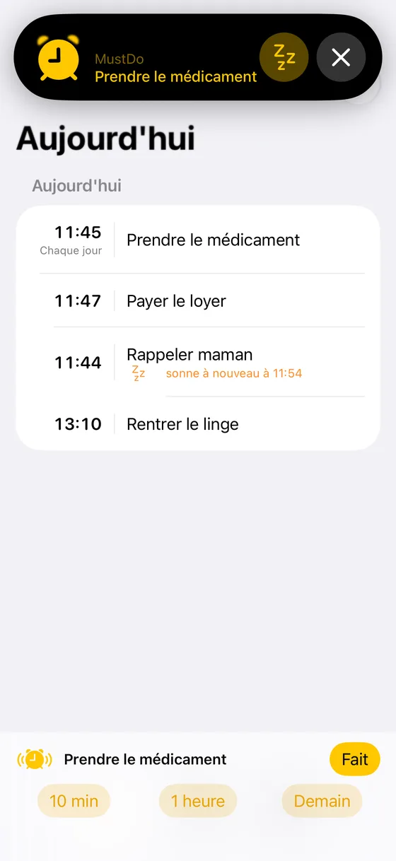 Une alarme MustDo qui sonne, avec les boutons Fait, 10 min, 1 heure et Demain